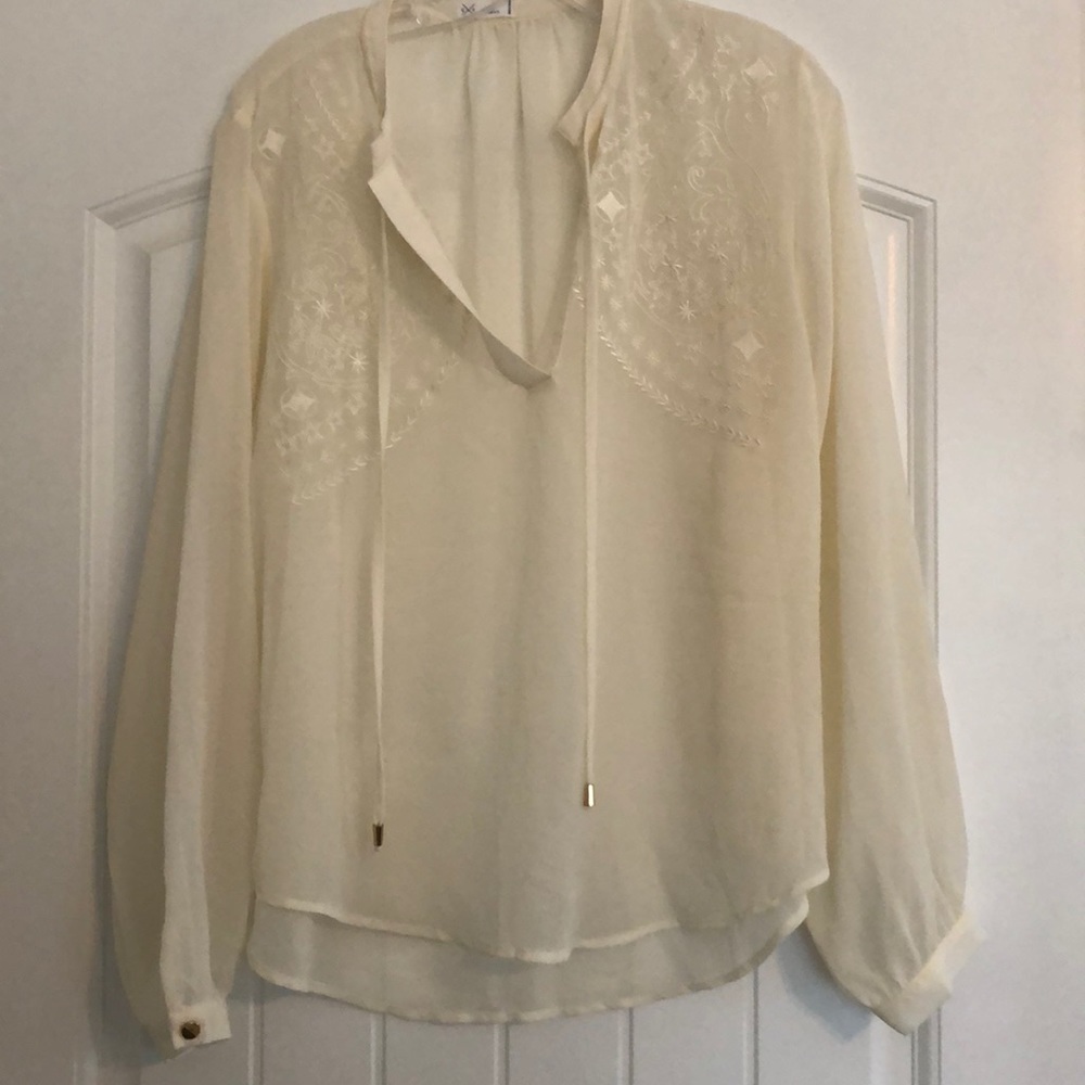 Ivory embroidered sweater through top